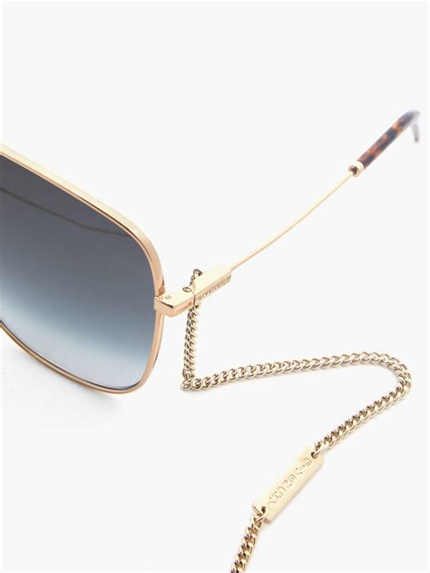 gold givenchy sunglasses|Givenchy sunglasses official website.